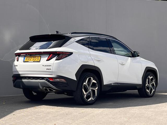 Hyundai TUCSON 1.6 T-GDI PHEV Premium 4WD / Dealer onderhouden / Accu SoH 100 %/ 1.350 kg trekgewicht / Leder / Navigatie / Electr. stoelen & klep / Stoelventilatie / Stuur-, stoel- & achterbankverwarming / 19" LM wielen /
