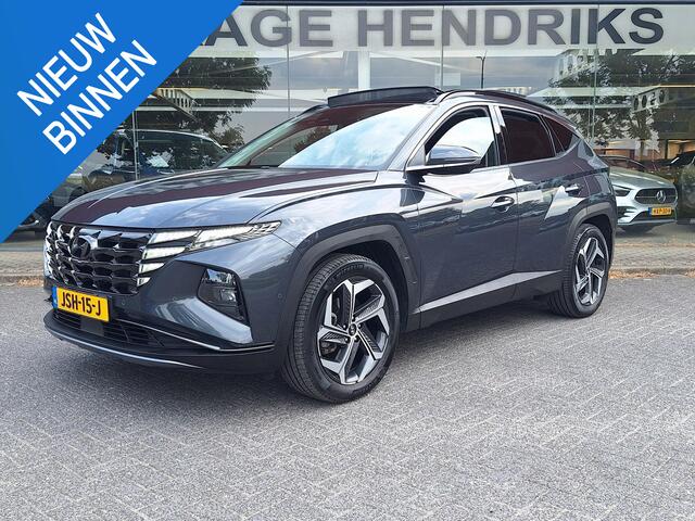 Hyundai TUCSON 1.6 T-GDI PHEV Premium Sky 4WD | Full Options! | Dealer onderhouden! | Trekhaak | Pano | Leder | LED | Blindspot |