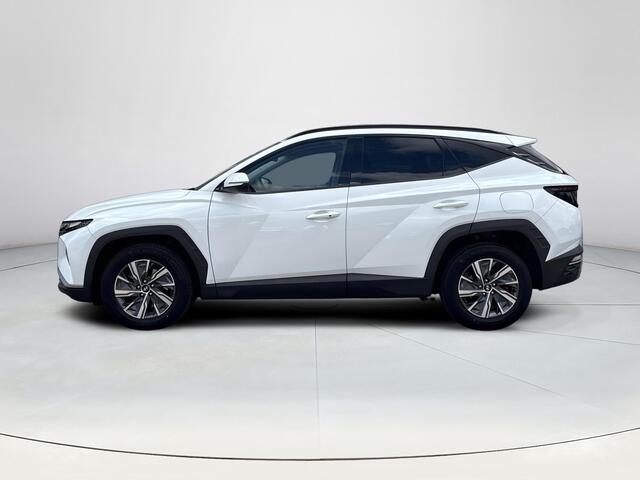 Hyundai TUCSON 1.6 T-GDI HEV Comfort Smart | Stoel en stuurverwarming | Trekhaak | Adaptieve cruise control | Elektrische achterklep | Achteruitrij camera | Parkeersensoren voor en achter |