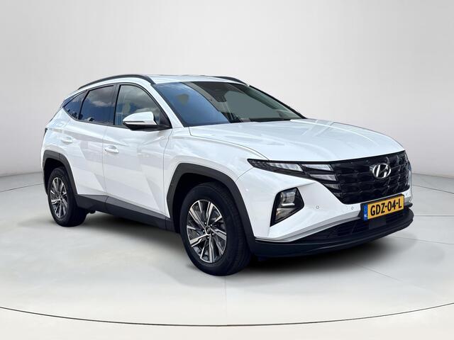 Hyundai TUCSON 1.6 T-GDI HEV Comfort Smart | Stoel en stuurverwarming | Trekhaak | Adaptieve cruise control | Elektrische achterklep | Achteruitrij camera | Parkeersensoren voor en achter |