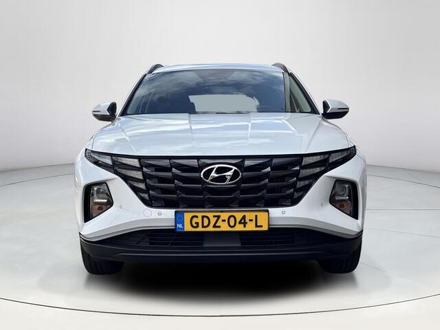 Hyundai TUCSON 1.6 T-GDI HEV Comfort Smart | Stoel en stuurverwarming | Trekhaak | Adaptieve cruise control | Elektrische achterklep | Achteruitrij camera | Parkeersensoren voor en achter |