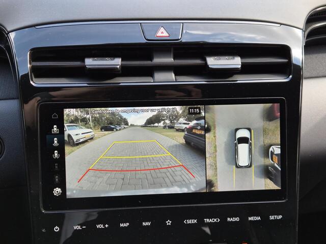 Hyundai TUCSON 1.6 T-GDI PHEV N Line Sky 4WD / SOH 100% / Fabrieksgarantie tot 12-2027 / Dealer onderhouden / Trekhaak afneembaar / Glazen schuif- en kanteldak / Trekgewicht 1350 kg / Adaptief cruise control / Rondomzicht camera / Stuur- Stoel & Achterbank verwarming /