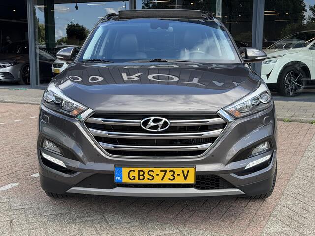 Hyundai TUCSON 1.6 T-GDi Premium 4WD LEDER | KEYLESS ENTRY/G | AUTOMAAT | AWD | CAMERA | ELEKTRISCH VERSTELBARE STOELEN | STOELVERWARMING | STUURVERWARMING | STUURKOELING | PANORAMADAK | NAVIGATIE | LED | XENON KOPLAMPEN | APPLE CARPLAY / ANDROID AUTO | CRUISECONTROL |