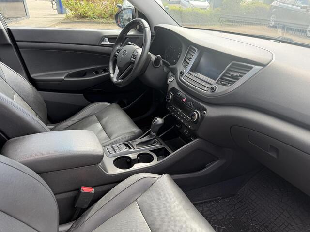 Hyundai TUCSON 1.6 T-GDi Premium 4WD LEDER | KEYLESS ENTRY/G | AUTOMAAT | AWD | CAMERA | ELEKTRISCH VERSTELBARE STOELEN | STOELVERWARMING | STUURVERWARMING | STUURKOELING | PANORAMADAK | NAVIGATIE | LED | XENON KOPLAMPEN | APPLE CARPLAY / ANDROID AUTO | CRUISECONTROL |