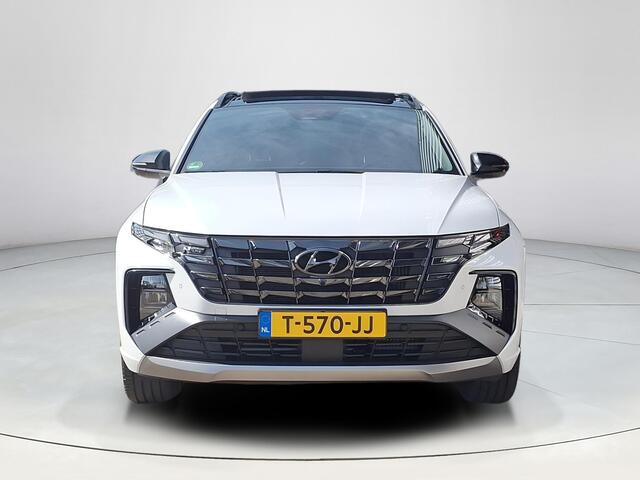 Hyundai TUCSON 1.6 T-GDI HEV N Line Sky | Apple Carplay/Android Auto | Stoel/stuurverwarming | 360 graden camera | Panoramisch schuif/kantel dak | Elektrische achterklep |