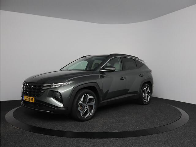 Hyundai TUCSON 1.6 T-GDI PHEV Premium Sky 4WD | Glazen schuif-kanteldak | Trekhaak