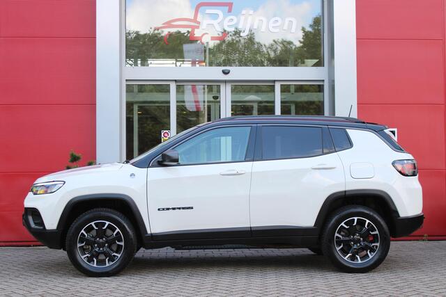Jeep COMPASS 4xe 240PK PHEV TRAILHAWK AUTOMAAT | NAVIGATIE | ACHTERUIRIJ CAMERA | DRAADLOOS APPLE CARPLAY / ANDROID AUTO | DIGITALE COCKPIT | LED KOPLAMPEN / ACHTERLICHTEN | LED MIST LAMPEN | 17" OFF-ROAD LICHTMETALEN VELGEN | ALL SEASON BANDEN | DRAADLOOS LADEN | AD