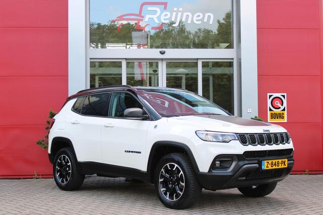 Jeep COMPASS 4xe 240PK PHEV TRAILHAWK AUTOMAAT | NAVIGATIE | ACHTERUIRIJ CAMERA | DRAADLOOS APPLE CARPLAY / ANDROID AUTO | DIGITALE COCKPIT | LED KOPLAMPEN / ACHTERLICHTEN | LED MIST LAMPEN | 17" OFF-ROAD LICHTMETALEN VELGEN | ALL SEASON BANDEN | DRAADLOOS LADEN | AD