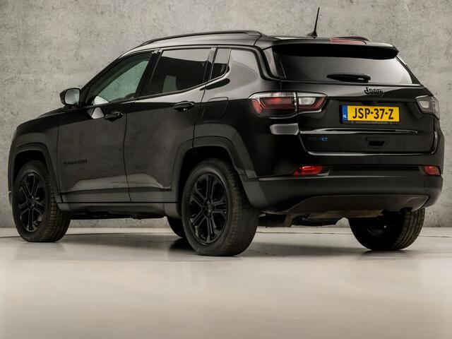 Jeep COMPASS 4xe 240 Plug-in Hybrid Electric Trailhawk 240Pk Automaat (VIRTUAL COCKPIT, APPLE CARPLAY, GROOT NAVI, LEDER, CAMERA, SPORTSTOELEN, KEYLESS, GETINT GLAS, ADAPTIVE CRUISE, NIEUWSTAAT)