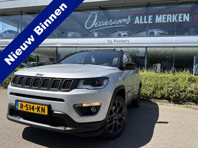 Jeep COMPASS 4xe 240 Plug-in Hybrid Electric Trailhawk Airco - Schuif/kanteldak - Achteruitrijcamera - Apple carplay - Parkeersensoren - Navigatie - Oplaadmogelijkheid - Lederen bekleding - Cruise control - Dakrails - Led verlichting - Elektrische ramen - Bluetooth -