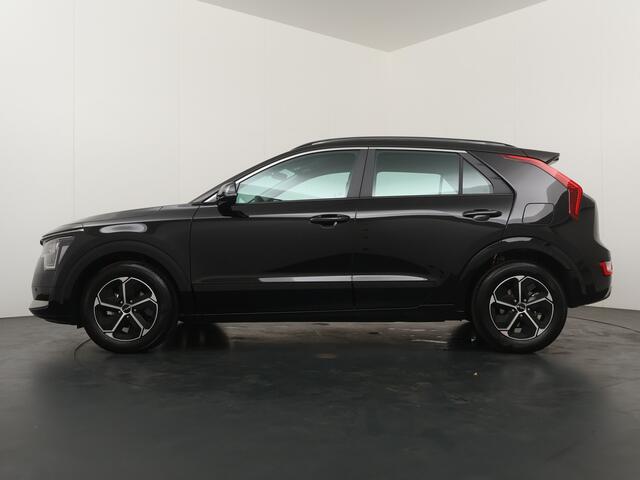 KIA Niro 1.6 GDi Hybrid DynamicLine - ¤5.000,- voordeel - Adaptieve cruise control - Navigatie - Keyless entry - Apple Carplay/Android Auto - Achteruitrijcamera - Parkeersensoren voor en achter - Fabrieksgarantie t/m 2033