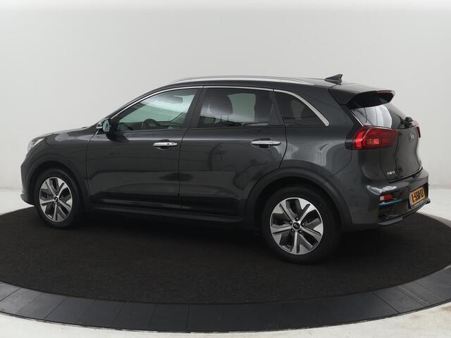 KIA e-Niro DynamicPlusLine 64 kWh | SOH 95,4% | Panoramadak | Half leder | Adaptive cruise | Stuur/stoel verwarming | Navigatie | Carplay | Camera | Park assist | Climate control