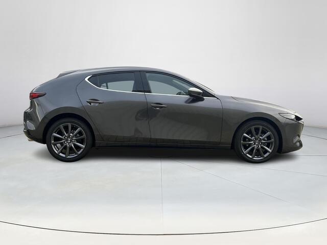 Mazda 3 2.5 e-SkyActiv-G M Hybrid 140 Takumi | Leder | Bose | Stoel/stuurverwarming | Adaptief cruise control | Elektrische verstelbare stoelen met geheugen | Achteruitrijcamera | Head-up display |