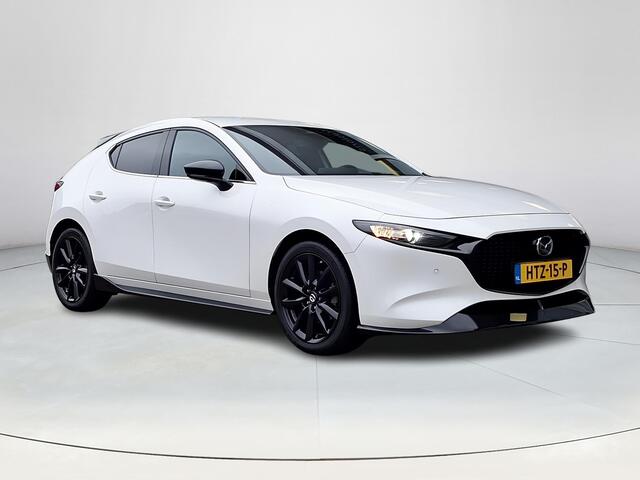 Mazda 3 2.0 e-SkyActiv-X M Hybrid 186 Nagisa | Aero pakket | Alcantara/Leder met stoelgeheugen | Achteruitrijcamera | Bose | HeadupDisplay | Navigatie en draadloze Applecarplay\Androidauto | Verlichte Dorpelbeschermers | Parelmoer Wit