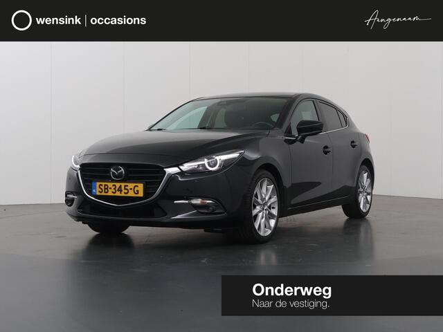 Mazda 3 2.0 SkyActiv-G 120 GT-M | Trekhaak | Bose Audio | Camera | HUD | Lederen Interieur | Stoelverwarming | LED | Navigatie | Adaptieve Cruise Control | Dodehoek detectie |