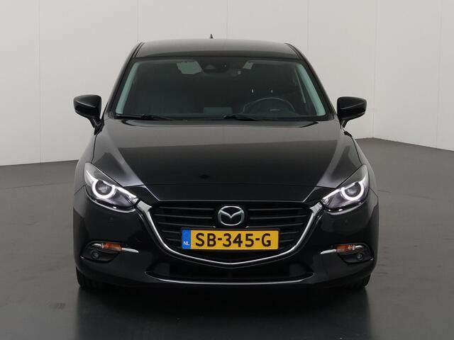 Mazda 3 2.0 SkyActiv-G 120 GT-M | Trekhaak | Bose Audio | Camera | HUD | Lederen Interieur | Stoelverwarming | LED | Navigatie | Adaptieve Cruise Control | Dodehoek detectie |