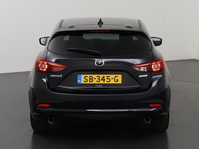 Mazda 3 2.0 SkyActiv-G 120 GT-M | Trekhaak | Bose Audio | Camera | HUD | Lederen Interieur | Stoelverwarming | LED | Navigatie | Adaptieve Cruise Control | Dodehoek detectie |