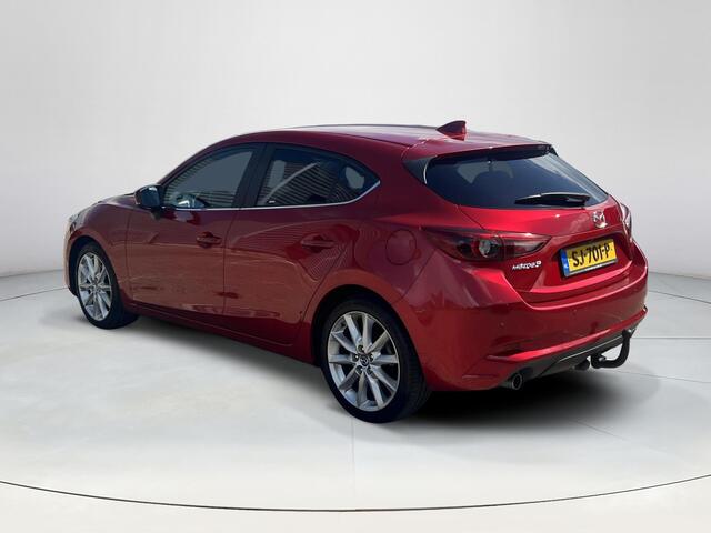 Mazda 3 2.0 SkyActiv-G 120 GT-M | Cruise Control | Navigatie | Bose Premium Audio | Lederen Bekleding | Stoel/Stuur Verwarming | Trekhaak Afneembaar | Head-Up Display | Lichtmetalen velgen |
