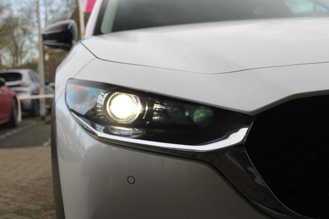 Mazda CX-30 2.0 e-SkyActiv-G M 150PK AUTOMAAT Hybrid HOMURA | HEAD UP DISPLAY | NAVIGATIE | ELEKTRISCHE ACHTERKLEP | DODEHOEK DETECTIE | APPLE CARPLAY/ANDROID AUTO | STOEL VERWARMING | ADAPTIVE CRUISE CONTROL | CLIMATE CONTROL | LICHTMETALEN VELGEN BLACK | GETINTE RU
