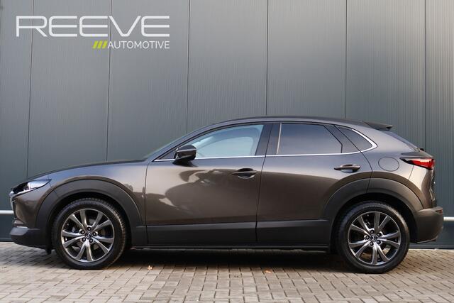 Mazda CX-30 2.0 e-SkyActiv-X M Hybrid Luxury Automaat | Leer | Trekhaak | Stoel- Stuurverwarming | Apple Carplay / Android Auto | HUD | Camera | ACC