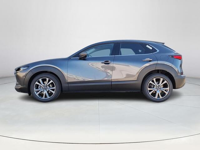 Mazda CX-30 2.5 e-SkyActiv-G M Hybrid Takumi | Automaat | Stoelgeheugen | Draadloze Apple carplay en Android Auto | 360 camera | Headup Display | Dodehoeksensoren | Stoel en stuurverwarming | Elektrische Achterklep | Adaptieve Cruise Control | Bose |