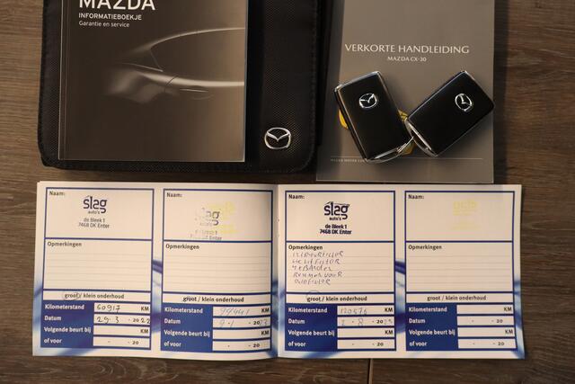 Mazda CX-30 2.0 SkyActiv-X Luxury Navigatie/Achteruitrijcamera/Bose/Trekhaak/Keyless Entry/Head-Up-Display/Leder&Stoelverwarning/Sensoren V&A/Climate&Cruisecontrol/Bleutooth met Spraakbediening/18 Inch Lmv