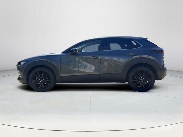 Mazda CX-30 2.0 e-SkyActiv-X M Hybrid Homura | Dodehoeksensoren | Draadloze Applecarplay en Android Auto | Adaptieve Cruise Control | Automaat | 18inch zwarte velgen | Achteruitrijcamera | Elektrische achterklep |