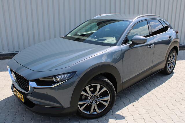 Mazda CX-30 2.0 e-SkyActiv-X M Hybrid Luxury | Adaptieve cruise control | Apple carplay/Android auto | Stoel/stuurverwarming | Trekhaak | Head-up display | Parkeercamera | Memory seat | Bose audio |