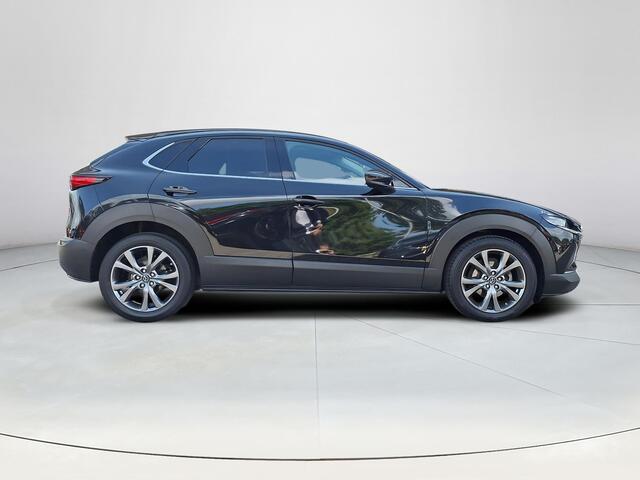 Mazda CX-30 2.0 e-SkyActiv-X M Hybrid Luxury | Apple Carplay/Android Auto | Elektrische verstelbare stoelen | BOSE geluidsinstallatie | Stoel/stuurverwarming | Elektrische achterklep | Head-up Display | Lichtmetalen velgen |