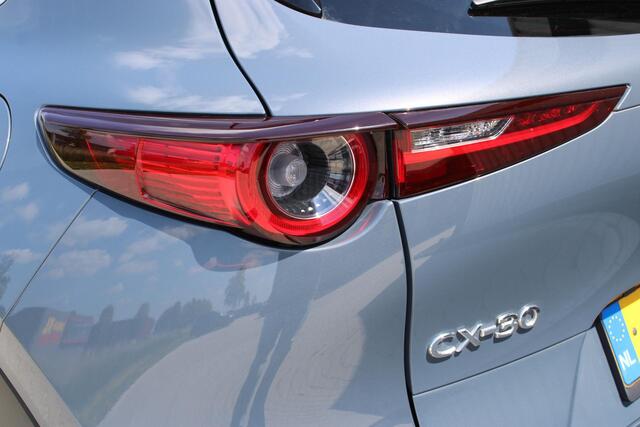 Mazda CX-30 2.0 e-SkyActiv-X M Hybrid Luxury | Incl. 12 maanden garantie | Adaptieve cruise control | Apple carplay/Android auto | Stoel/stuurverwarming | Trekhaak | Head-up display | Parkeercamera | Memory seat | Bose audio |