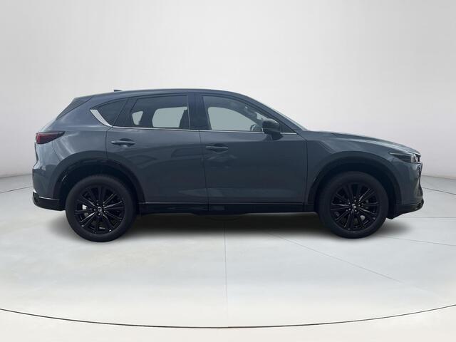 Mazda CX-5 2.0 e-SkyActiv-G M Hybrid 165 Homura | ¤ 5.555,- korting | Elektrische stoelen met geheugenstand | Stoelkoeling en Verwarming | Stuurverwarming | 360 Camera | Bose | Adaptieve cruise control | Head-up Display |