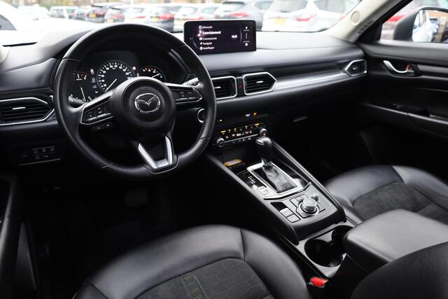 Mazda CX-5 2.0 e-SkyActiv-G M Hybrid 165 Newground HUD CARPLAY LEER/ALCANTARA 360-CAMERA STOEL/STUURVERW. ELEC.KLEP/STOEL LANE-ASSIST HILL-HOLD KEYLESS CRUISE CLIMA DAB 2XPDC 19''LMV