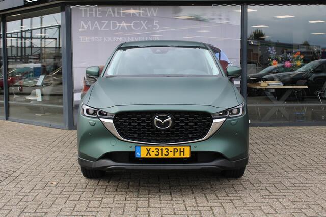 Mazda CX-5 2.0 e-SkyActiv-G M Hybrid 165 Exclusive-Line+Com.P , Automaat, Matte Metallic Pine Green gewrapped, Black Comfort Pack, Navi, Adap.Cruise, Clima, Apple Carplay, 360 Camera, PDC, HUD, Stuur/Stoelverwarming, 19" LMV