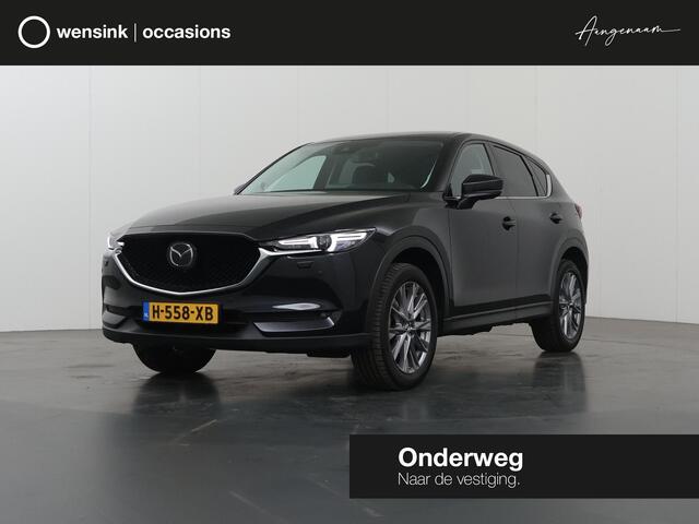 Mazda CX-5 2.0 SkyActiv-G 165 Luxury | 2000kg trekgewicht | Trekhaak | Navigatie | Stoelverwarming/koeling | Ele. verstelbare stoelen + geheugen | 360 Camera | DAB | Apple Carplay/Android Auto | HUD | Bose Audio |