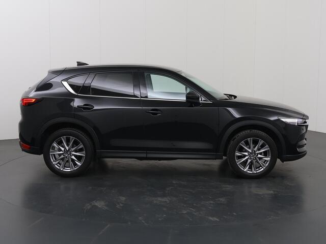 Mazda CX-5 2.0 SkyActiv-G 165 Luxury | 2000kg trekgewicht | Trekhaak | Navigatie | Stoelverwarming/koeling | Ele. verstelbare stoelen + geheugen | 360 Camera | DAB | Apple Carplay/Android Auto | HUD | Bose Audio |