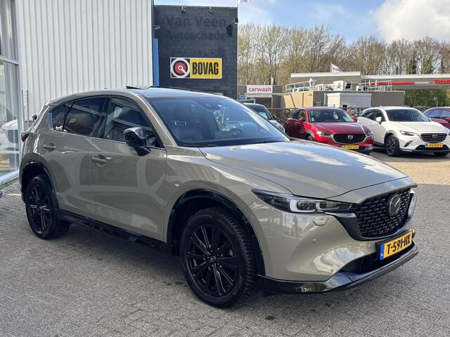 Mazda CX-5 2.5 e-SkyActiv-G M Hybrid 194 Homura NL-Auto, Dealer ondh., Trekhaak, Schuifdak, Navigatie, Apple Carplay /Android Auto, Bose, Cruise Controle ad., Head-up, All Seasons.