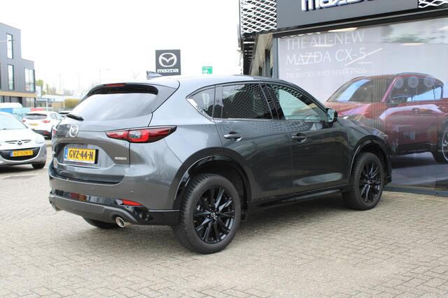 Mazda CX-5 2.0 e-SkyActiv-G M Hybrid 165 Homura , Automaat, Trekhaak, Leder, Bose, Adap.Cruise, 360 Camera, Clima, Stoel/Stuurverwarming, Stoelventilatie, Apple Carplay, Android Auto, LMV 19 Inch, PDC, LKA, BSM, HUD
