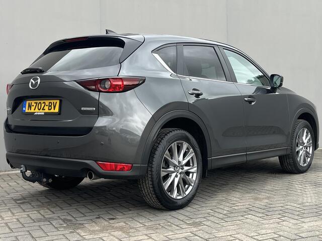 Mazda CX-5 2.0 SkyActiv-G 165 Comfort / Trekhaak (2.000KG) / Cruise Control / Lane Assist / Dode Hoek Detectie / Stuur-, Stoel Verwarming / Airco / Bluetooth / Full-Map Navigatie / Elektr-Bestuurderstoel Met Geheugen /