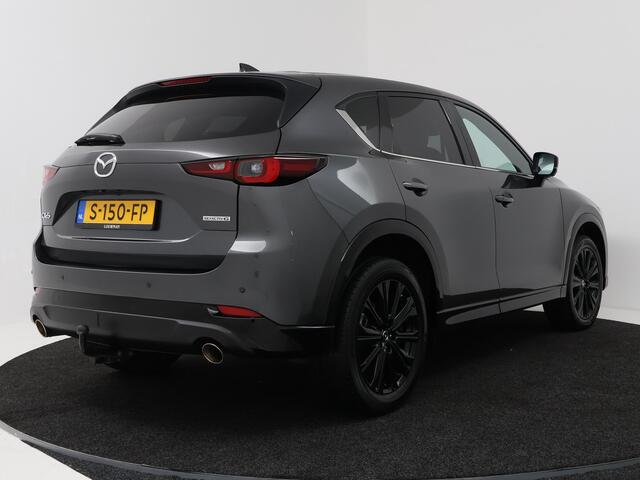 Mazda CX-5 2.0 SkyActiv-G 165 Homura Limited | Trekhaak | 360 Camera | Stuur-/Stoelverwarming | Navigatie | Apple Carplay/Android Auto | Elektrisch verstelbare stoel |