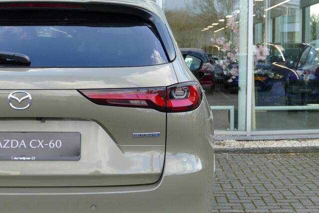 Mazda CX-60 2.5 e-SkyActiv PHEV Homura Business Edition | Voorraad auto | Snel rijden | Foto's ter illustratie |