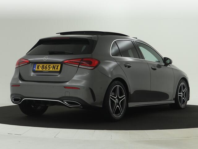 Mercedes-Benz A-KLASSE 180 Business Solution AMG | Panoramadak | 5 spaaks lichtmetalen velgen | MBUX wide screen | Navigatie | Parking support | Inclusief 24 maanden MB Certified garantie voor Europa.