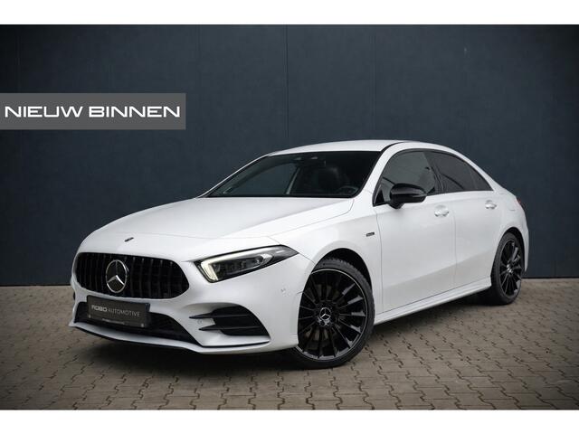 Mercedes-Benz A-KLASSE 180 Business Solution AMG | Stoelverwarming | Camera | Ambiance Verlichting | Keyless | Apple Carplay | Navigatie | Cruise Control |