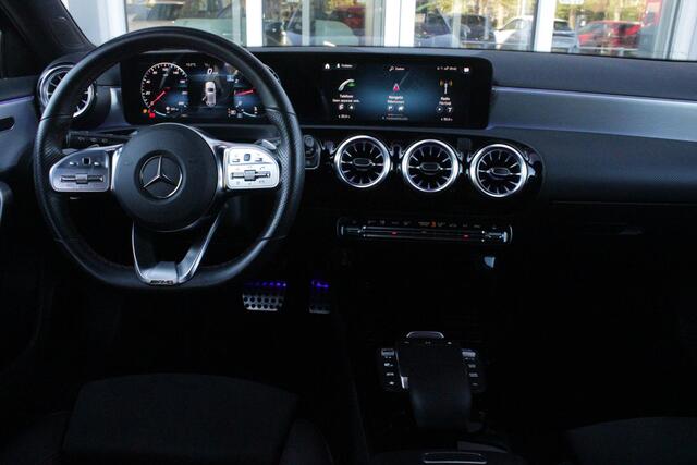 Mercedes-Benz A-KLASSE 180 BUSINESS SOLUTION AMG | PANORAMA SCHUIF/KANTEL DAK | SFEER VERLICHTING | ELEKTRISCH VERSTELBARE VOORSTOELEN MET GEHEUGEN FUNCTIE | STOEL VERWARMING OP BEIDE VOORSTOELEN | MULTIBEAM LED KOPLAMPEN | ACHTERUITRIJ CAMERA | APPLE CARPLAY/ANDROID AUTO | NAV