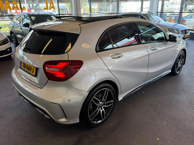 Mercedes-Benz A-KLASSE 180 AMG White Art | Automaat | Panoramadak | Achteruitrijcamera | Origineel Nederlands | Cruise control | Climate control | Adaptief onderstel | 18''INCH AMG | Navigatie