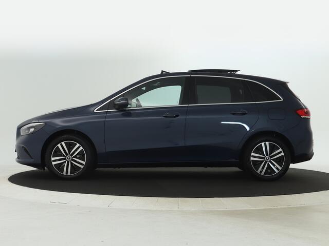 Mercedes-Benz B-KLASSE 250 e Plug-In Hybride | Panorama Schuif-Kanteldak | Multibeam Koplampen | Dodehoekassist | Memory voorstoelen | Sfeerverlichting. Inclusief 24 maanden MB Certified garantie voor Europa.