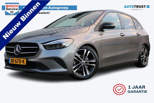 Mercedes-Benz B-KLASSE 200 Premium | Incl. 12 maanden garantie | Adaptieve cruise control | Climate control | Parkeercamera | Navigatie | Stoelverwarming | Trekhaak uitklapbaar | Elektrische kofferbakklep |