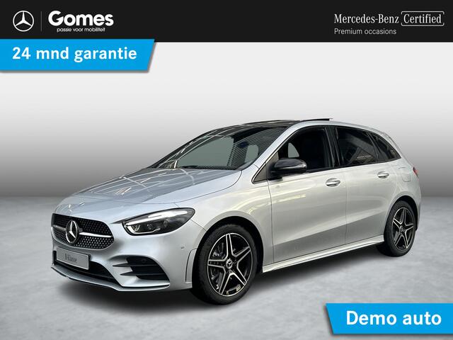 Mercedes-Benz B-KLASSE 250 e Business Solution AMG | Night Pakket | Panoramadak | Trekhaak | DISTRONIC Afstandsassistent | Dodehoekassistent | MULTIBEAM LED Koplampen | Stoelverwarming | Sfeerverlichting | Apple CarPlay | Android Auto | Sierdelen Lindehout Zwart | Elektrische A