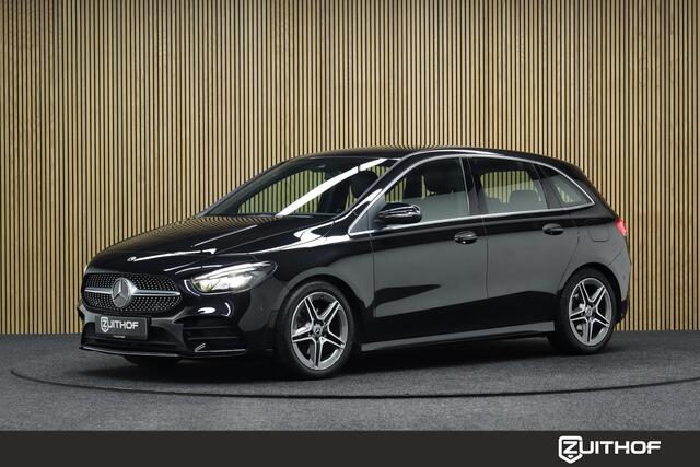 Mercedes-Benz B-KLASSE 180 Business Solution AMG | Afneembare Trekhaak | Cruise-control | Camera | Clima | Navigatie | Apple Carplay & Android Auto | Leder-Alcantara | Parkeersensoren V+A | AMG Velgen | Stoelverwarming