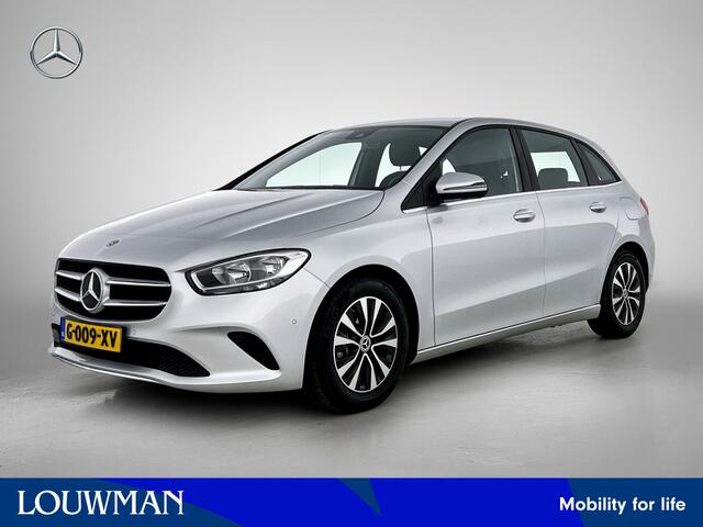 Mercedes-Benz B-KLASSE 180 Business Solution | Trekhaak | Car Play | Cruise Controle | Navigatie | Parkeerpakket met Camera | Inclusief 12 Maanden Garantie.