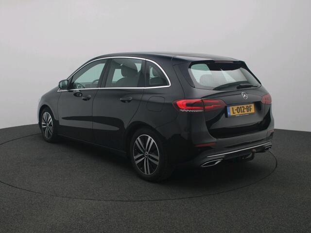 Mercedes-Benz B-KLASSE 180 Business Solution Luxury Trekhaak | Parkeerpakket met achteruitrijcamera | Ledkoplampen | Sfeerverlichting | Stoelverwarming. Inclusief 24 maanden MB Certified garantie voor Europa.